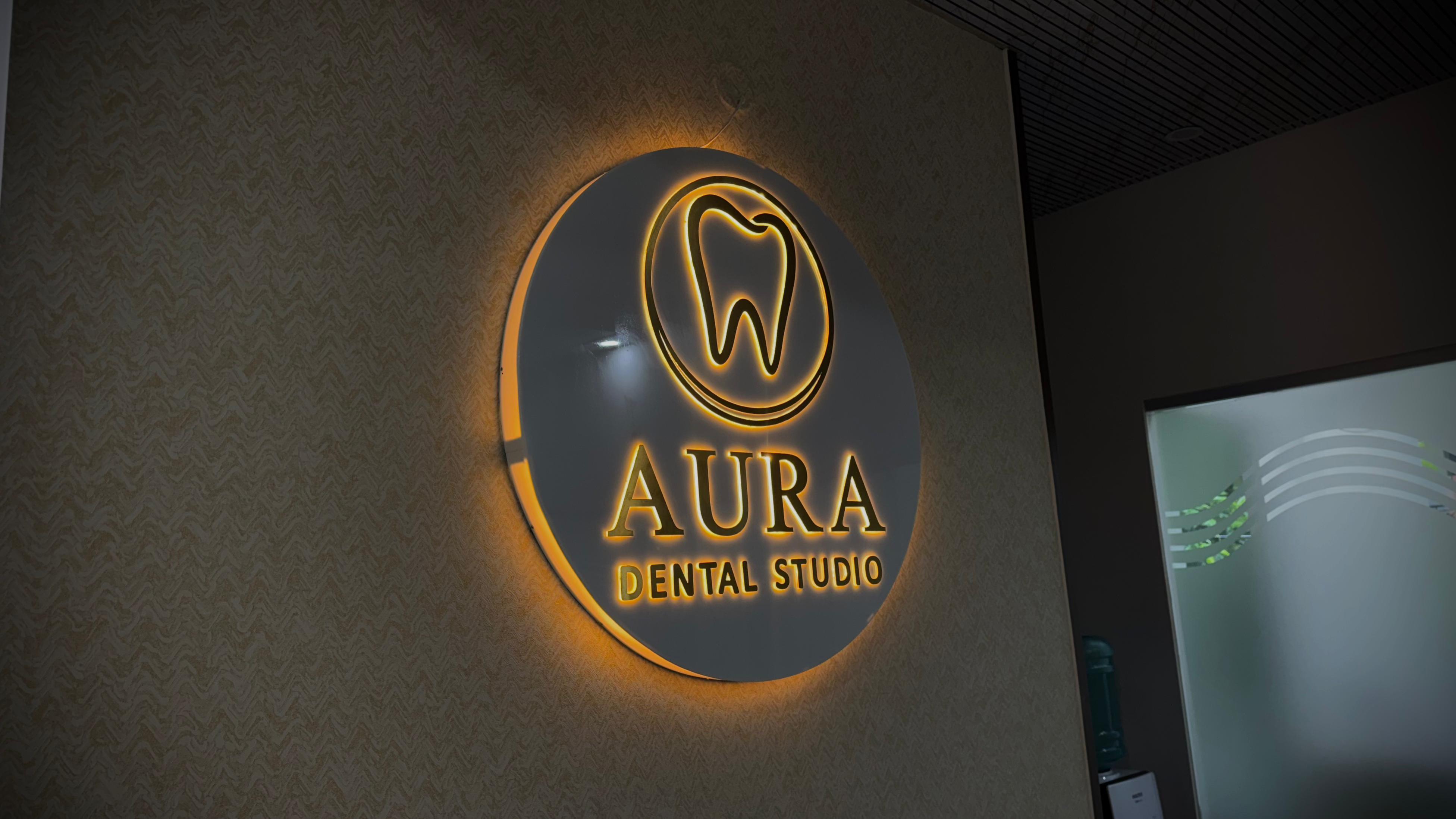 Illuminated Aura Dental Studio logo